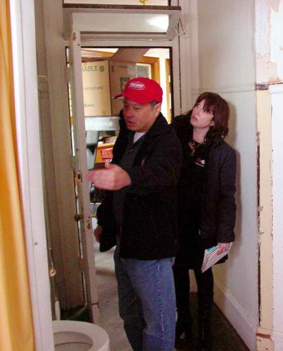 Lee shows production designer Judy Becker ...